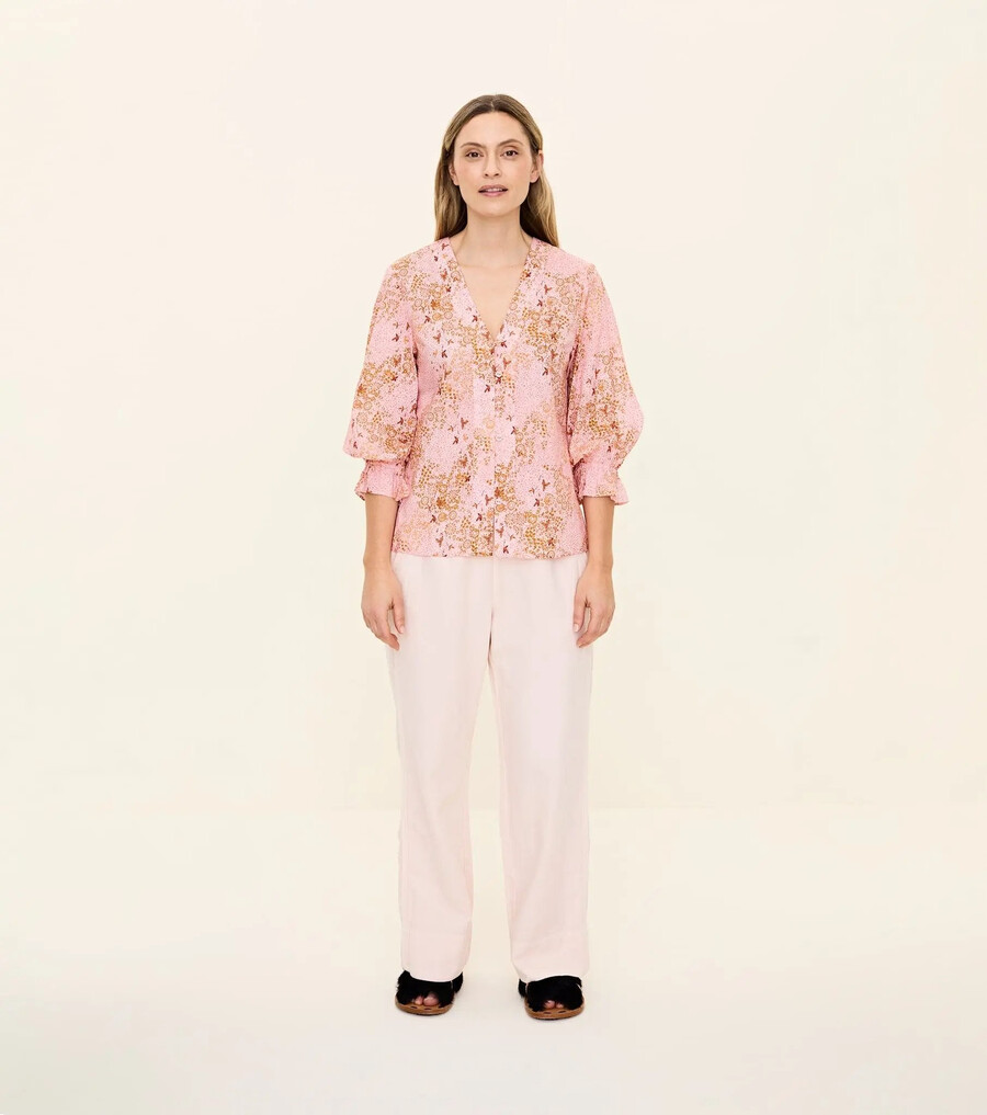blusa floreciente
