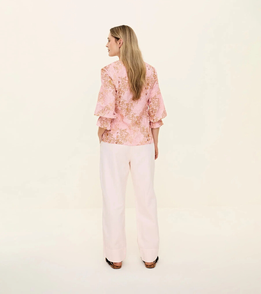 blusa floreciente