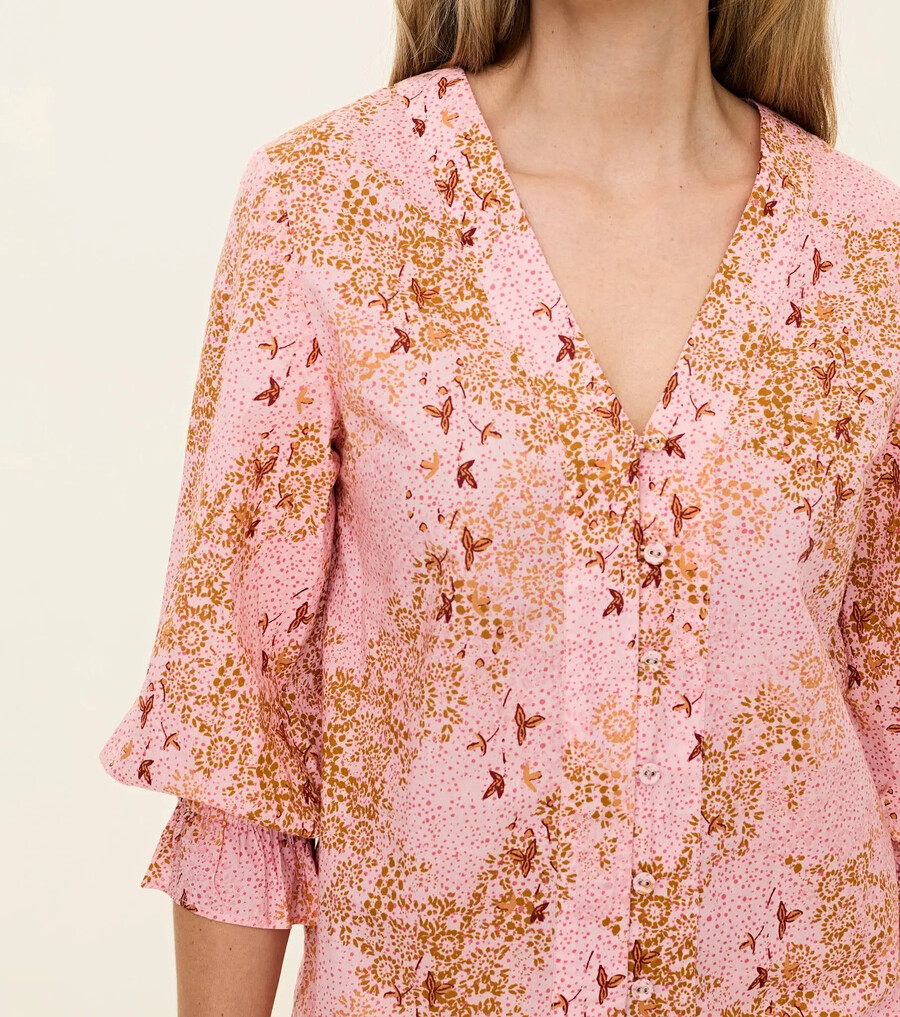 blusa floreciente