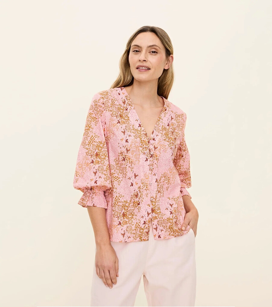 blusa floreciente